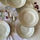 6 antique off-white porcelain soup plates with gold rim from Limoges