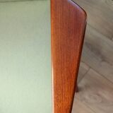 Vintage armchair in mint green wool, mid-century modern design.