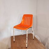 Chair with openwork plastic shell 1970
