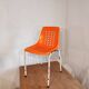 Chair with openwork plastic shell 1970