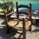 Low straw armchair