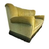 Vintage yellow-green fringed three-seater sofa