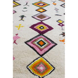 Berber carpet with knotted stitches in natural wool