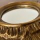 Vintage sun mirror in golden resin 60s/70s