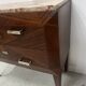 Commode Art Déco a pans coupées en placage d'acajou XX siècle