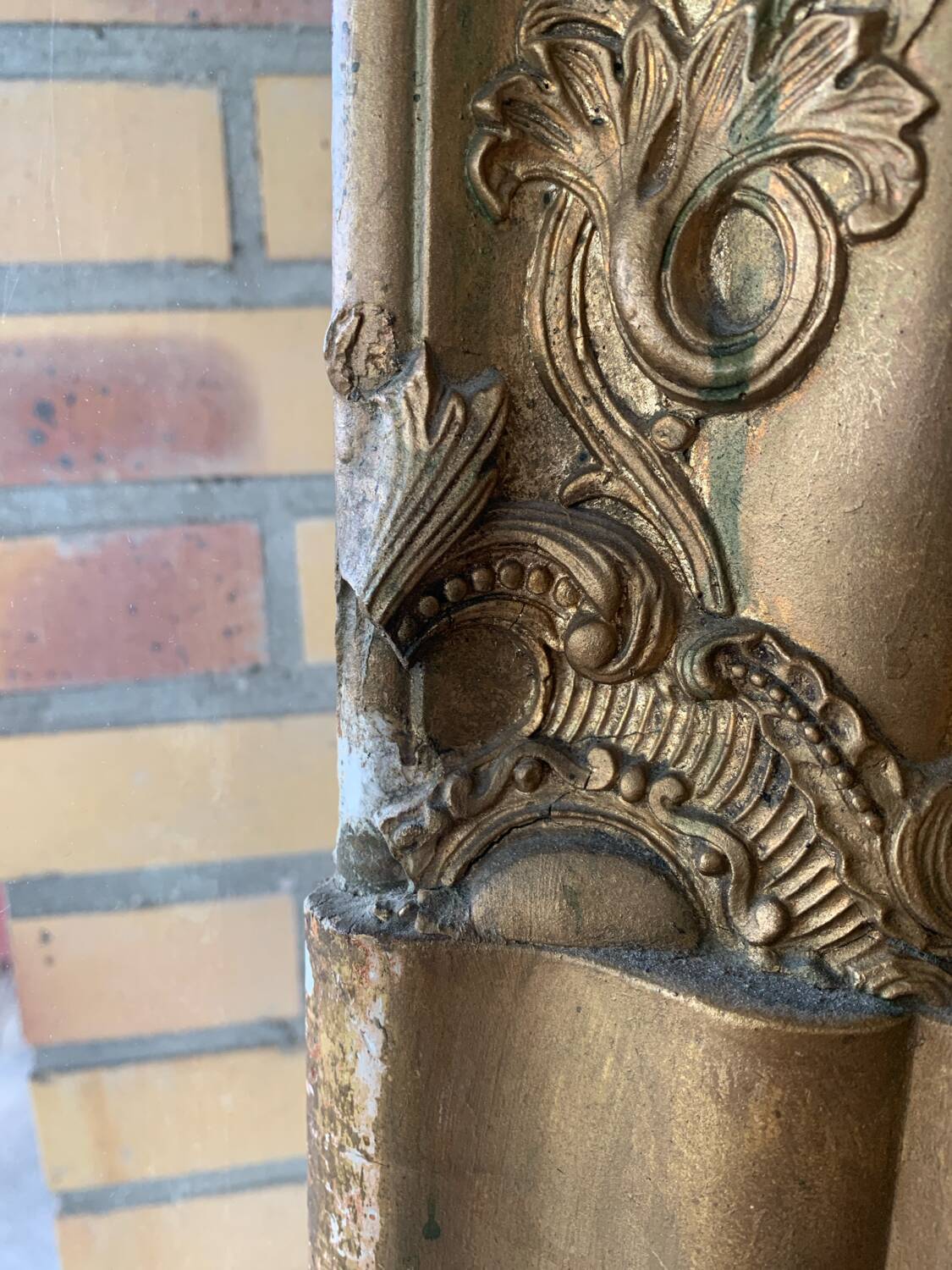 Old gilded mirror fireplace, 19th century restoration