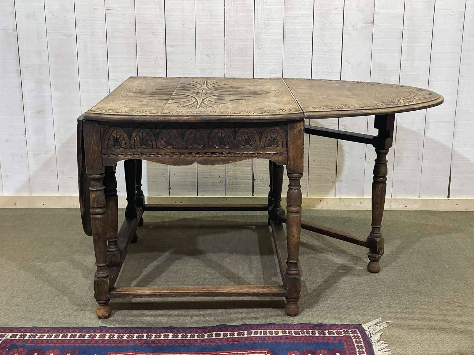 English oak drop-leaf table from the early 20th century