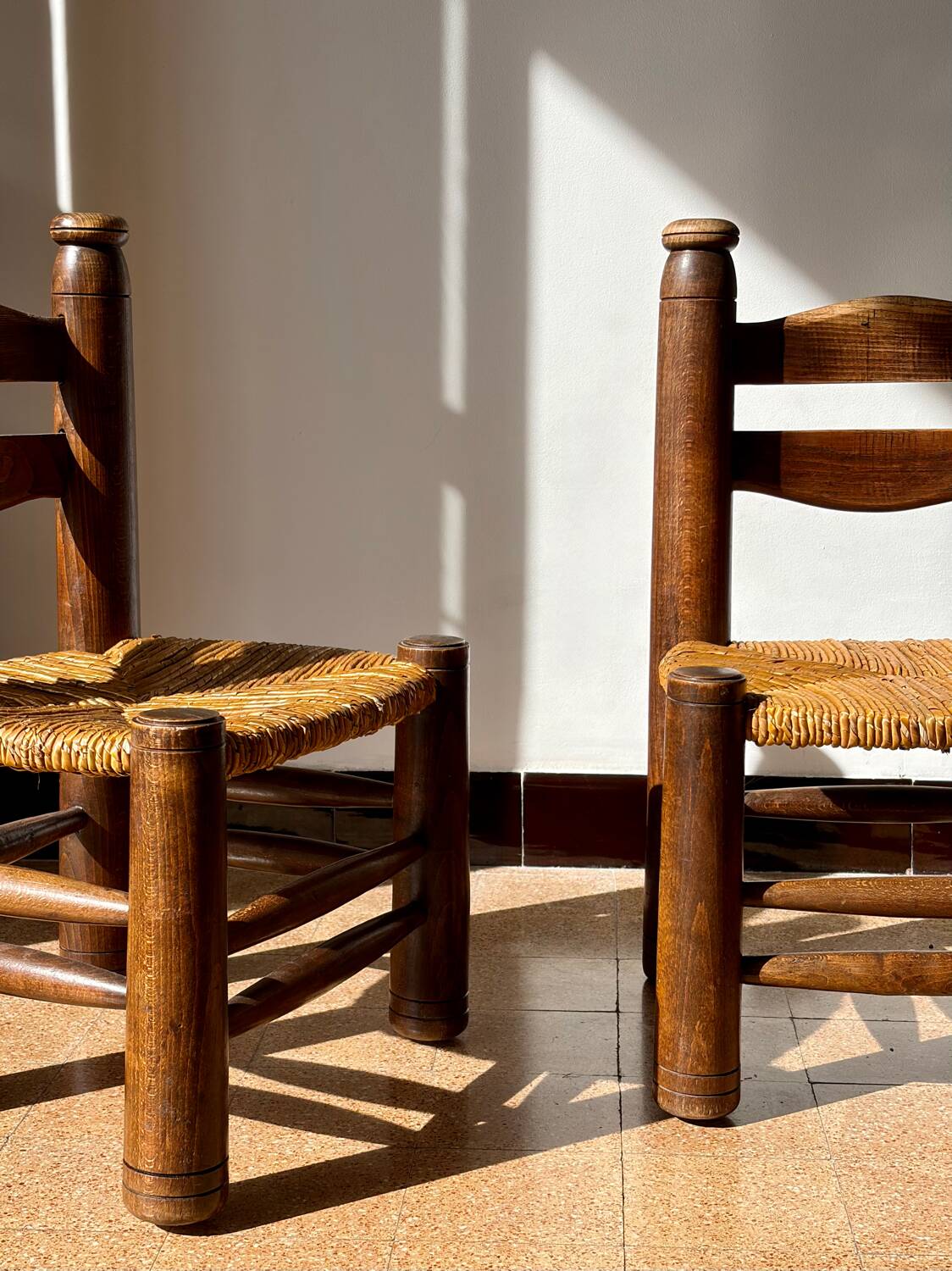 Low fireplace chair attributed to Charles Dudouyt.