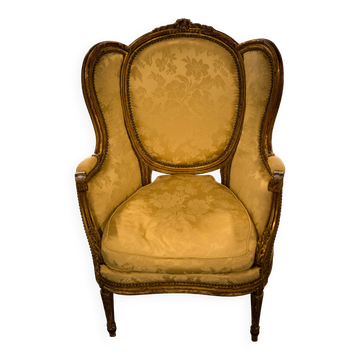 Pair of wingback armchairs from the eighteenth century.