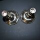 Pair of antique octagonal candlesticks in silvered bronze, Regency style.