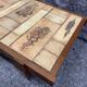 Table basse en bois et céramique herbier