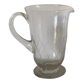 Chiseled glass pitcher