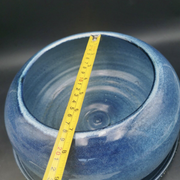 Blue ceramic bowl and its undercut