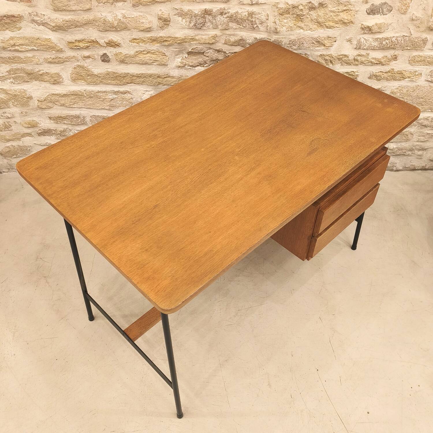Modernist desk with suspended drawer unit, French work from the 1950s.