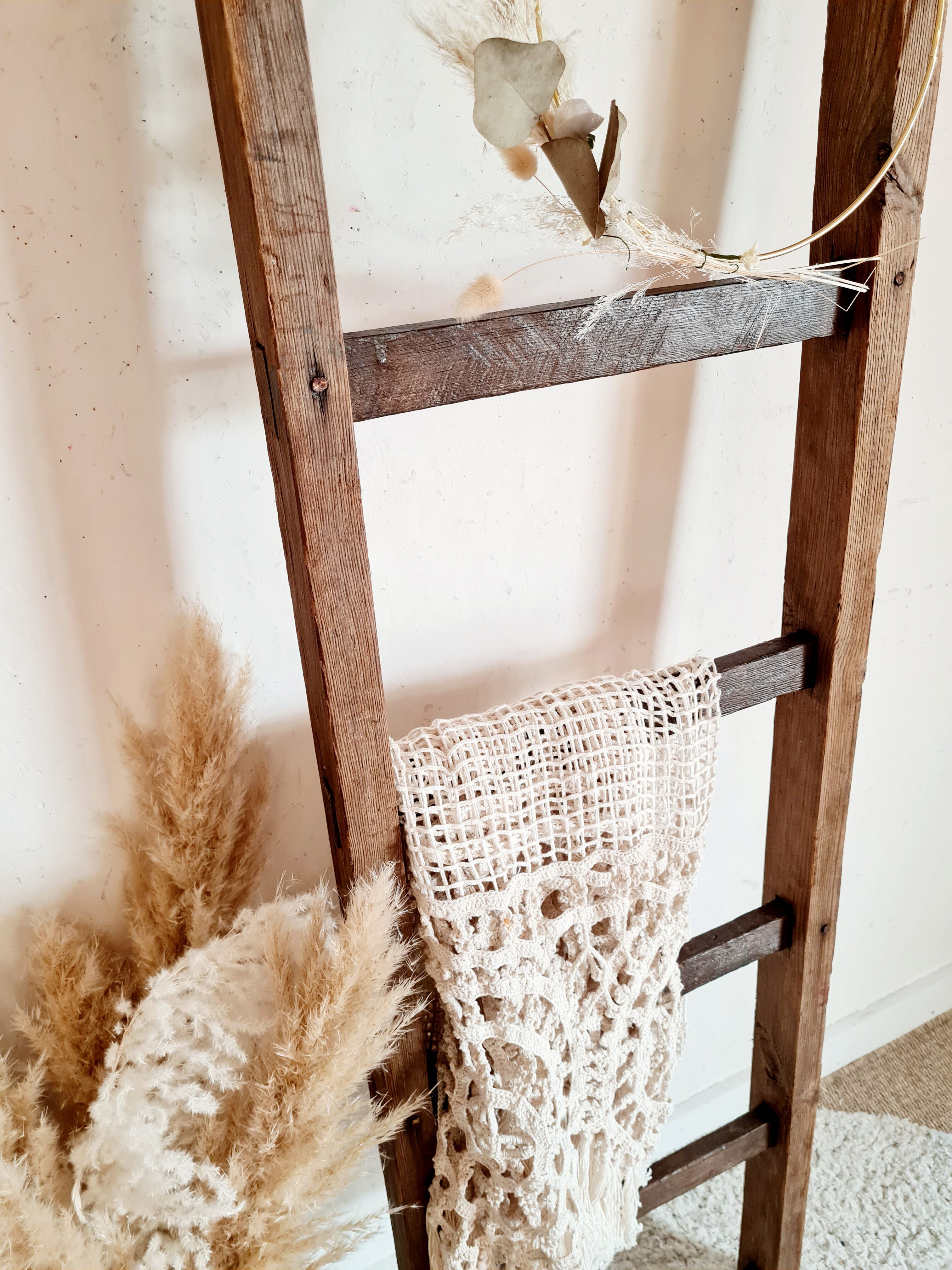 Old wooden farm ladder