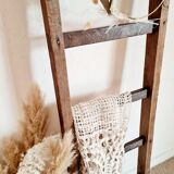 Old wooden farm ladder