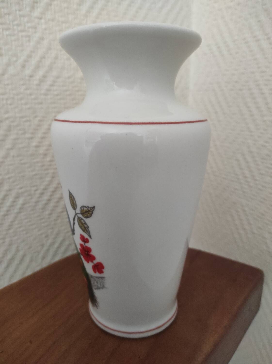 Porcelain vase with peacock decoration
