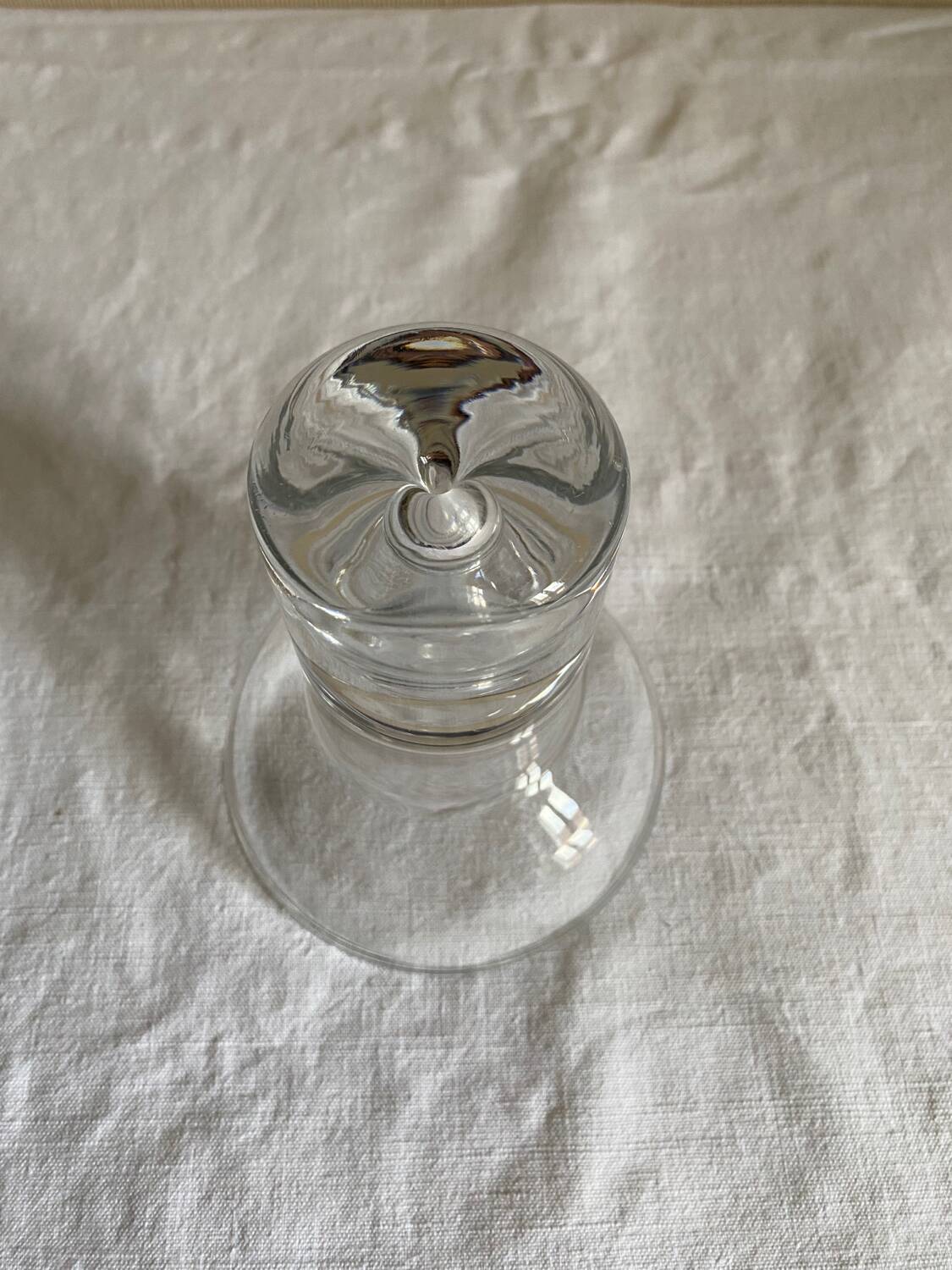 Crystal candle holder, base decorated with a drop