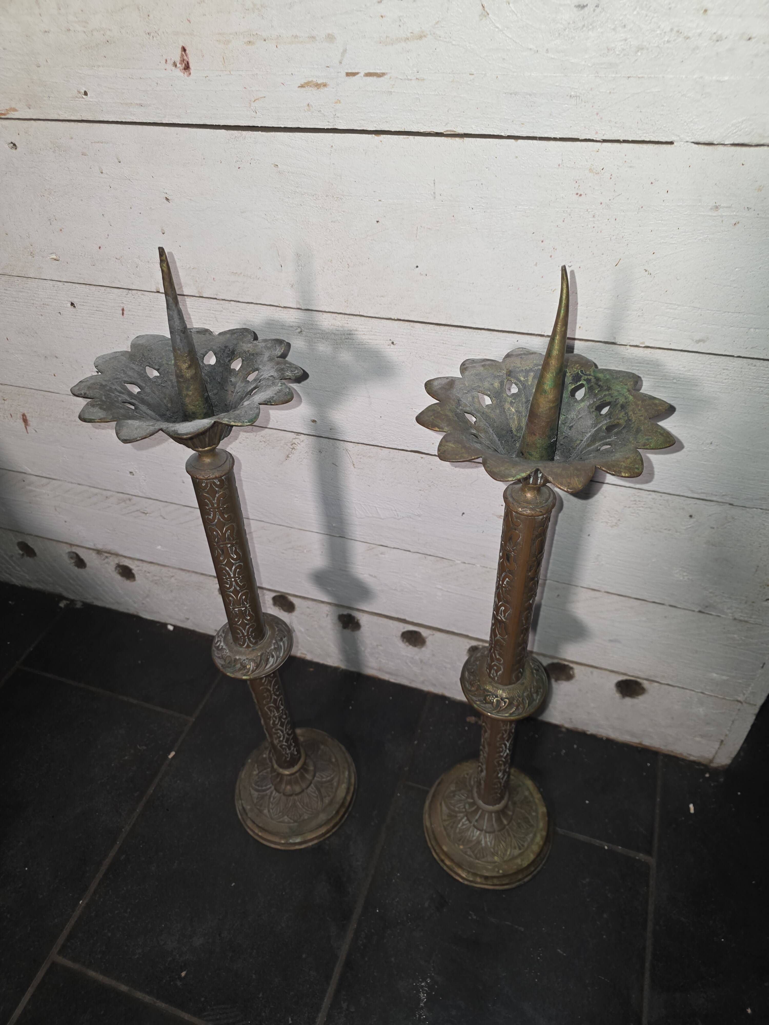 Pair of old candlesticks