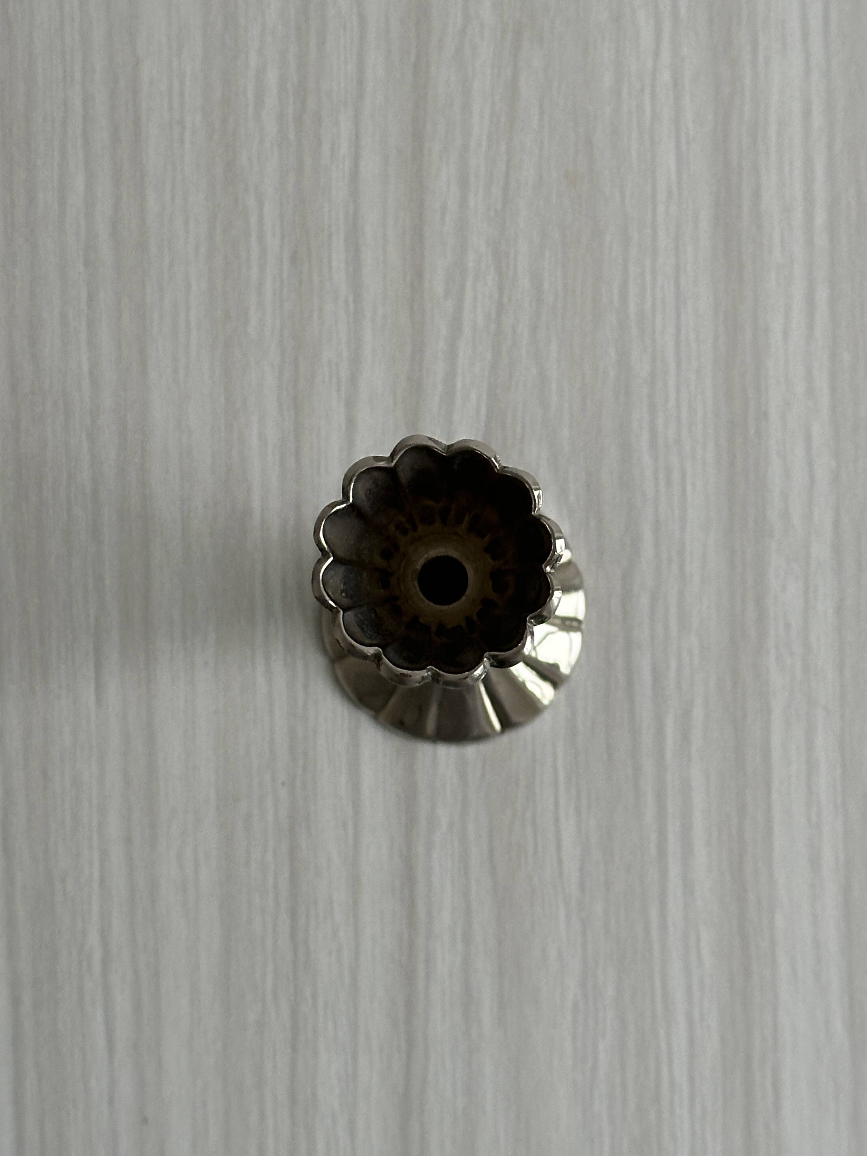 slender chrome metal candlestick