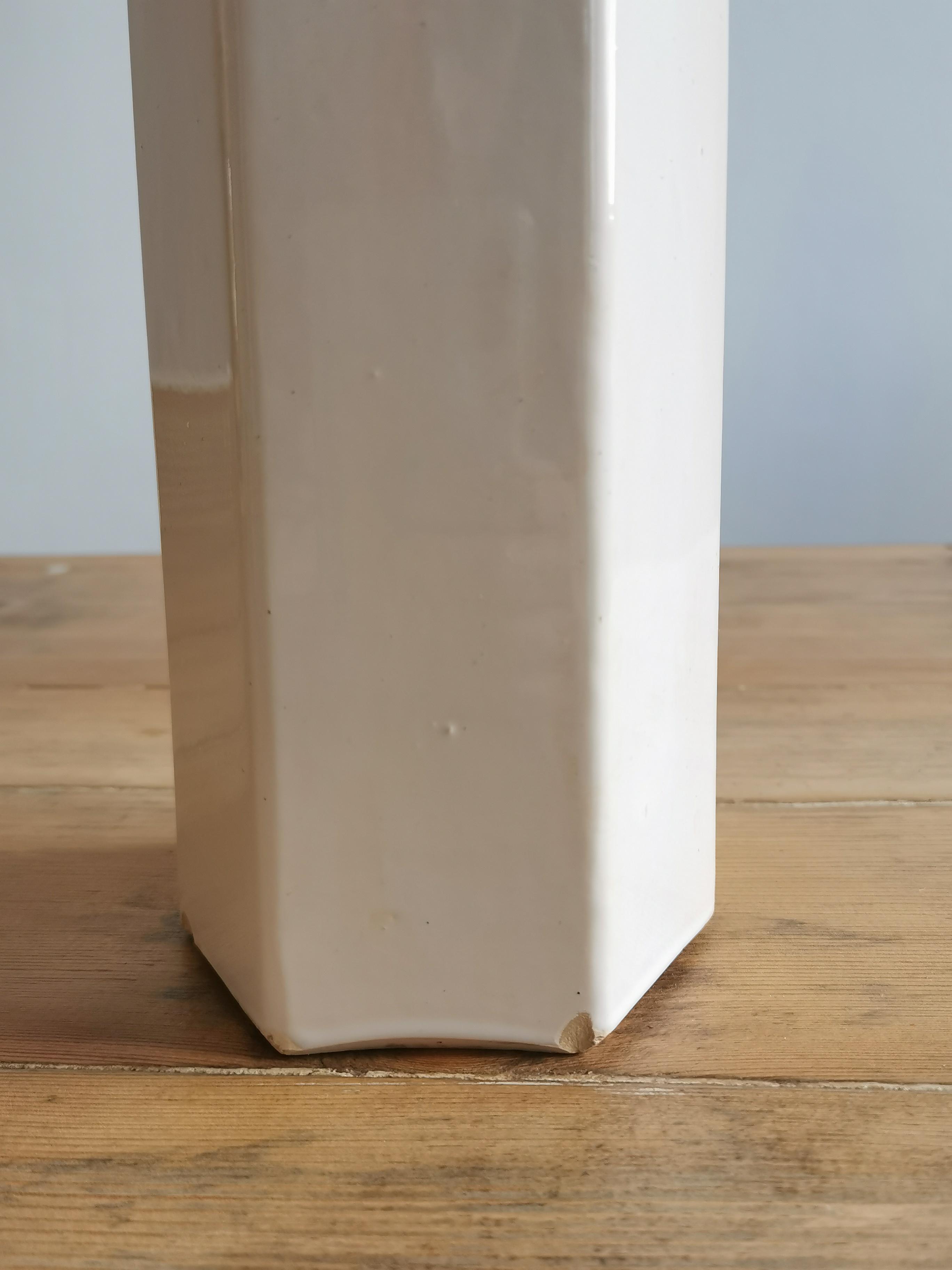 Hexagonal sandstone bottle