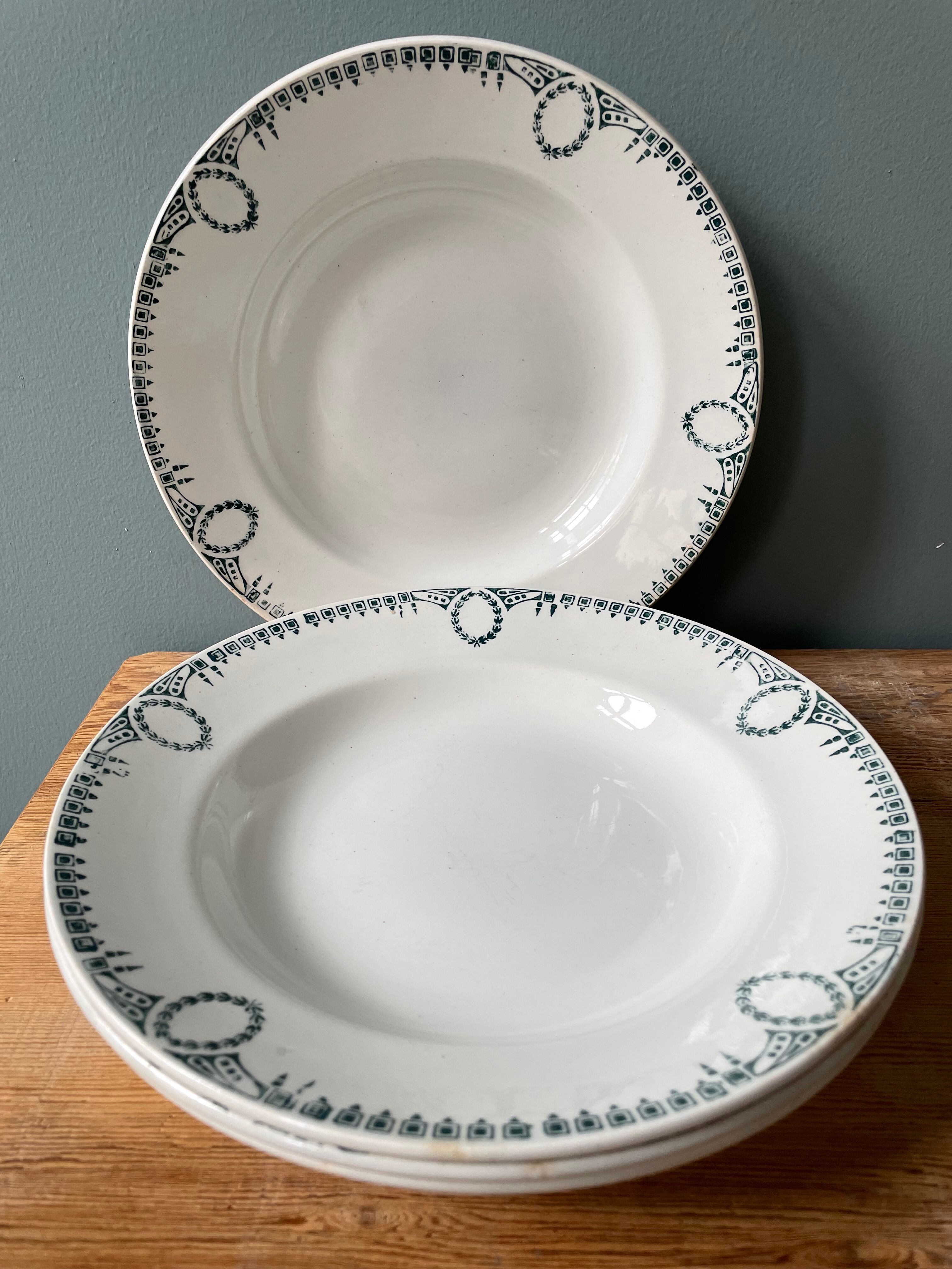 Set of 4 old hollow plates St Amand Terre de Fer