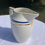 White porcelain decanter with blue and gold edging