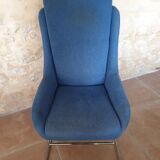 Armchair and its footrest