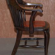 Antique English Edwardian captain's chair in oak by Ralph Johnson.