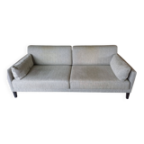 Duvivier canapé 104 Mayenne Alaska pebble fabric and its headrests.
