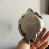 Empty silver swan pocket