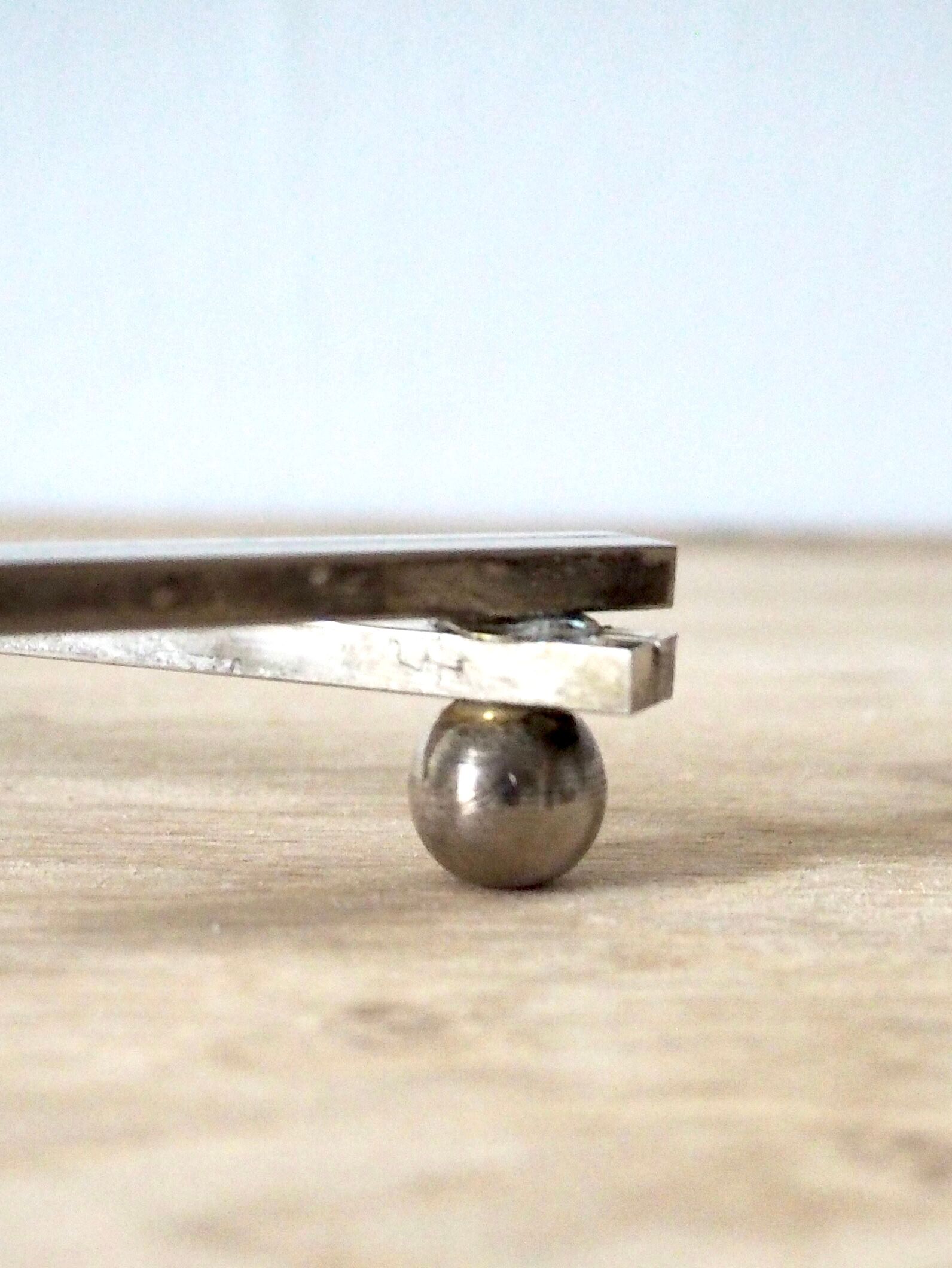 Expandable silver plated trivet