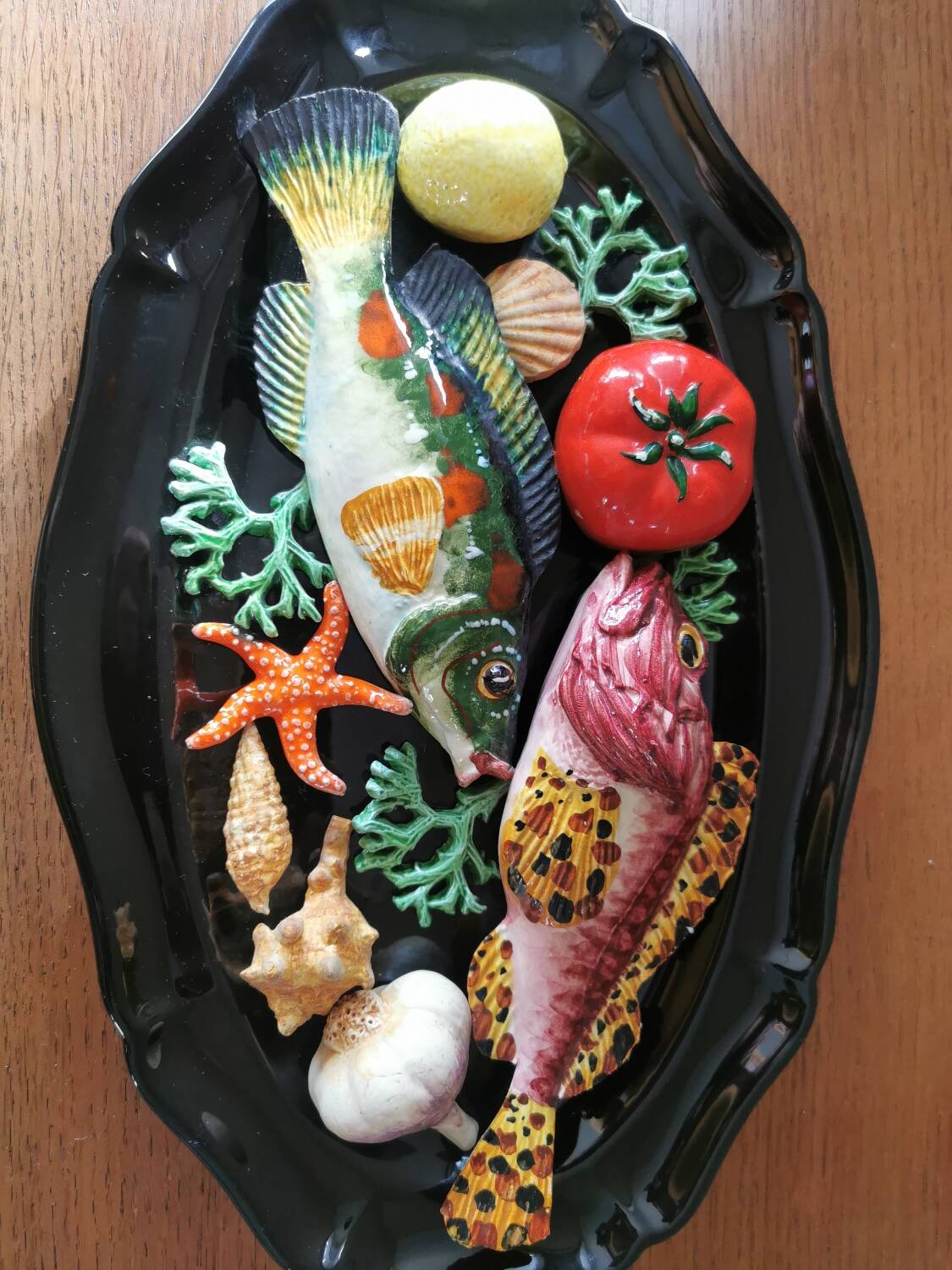 Vintage barbotine dish with fish decoration in relief