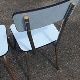 2 sky blue Formica chairs