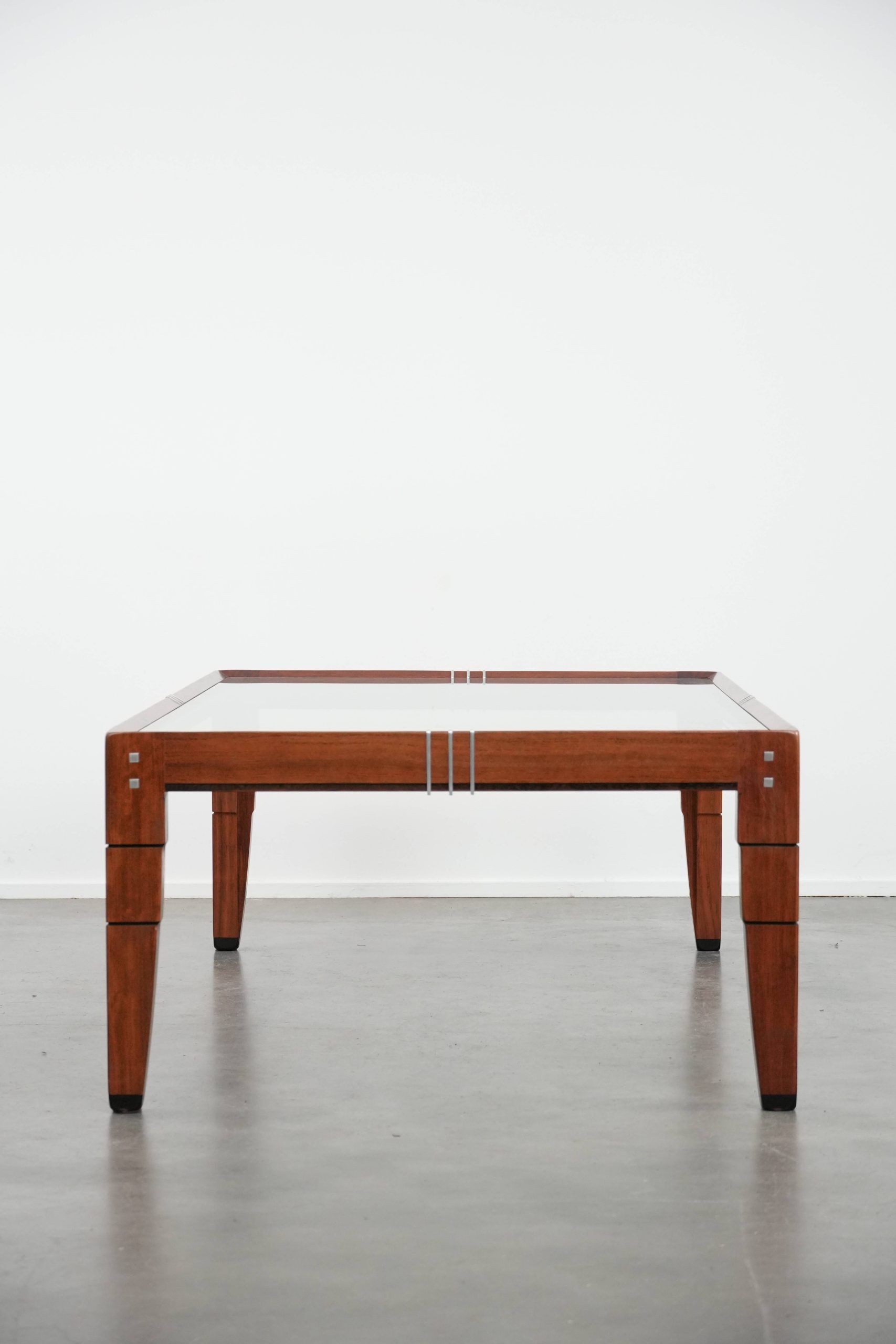 Beautiful Art Deco design coffee table with a glass top