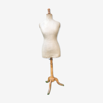 Old mannequin in wood and fabric