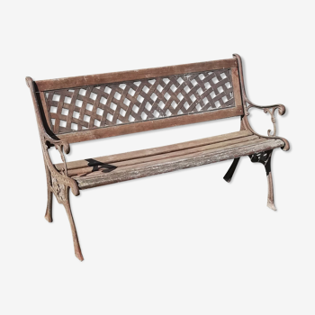 Metal and wood bench with slats