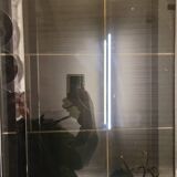 Chromed metal coffee table with smoked glass top from the 70s