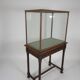 Antique display cabinet in 19th-century Gothic Revival style.