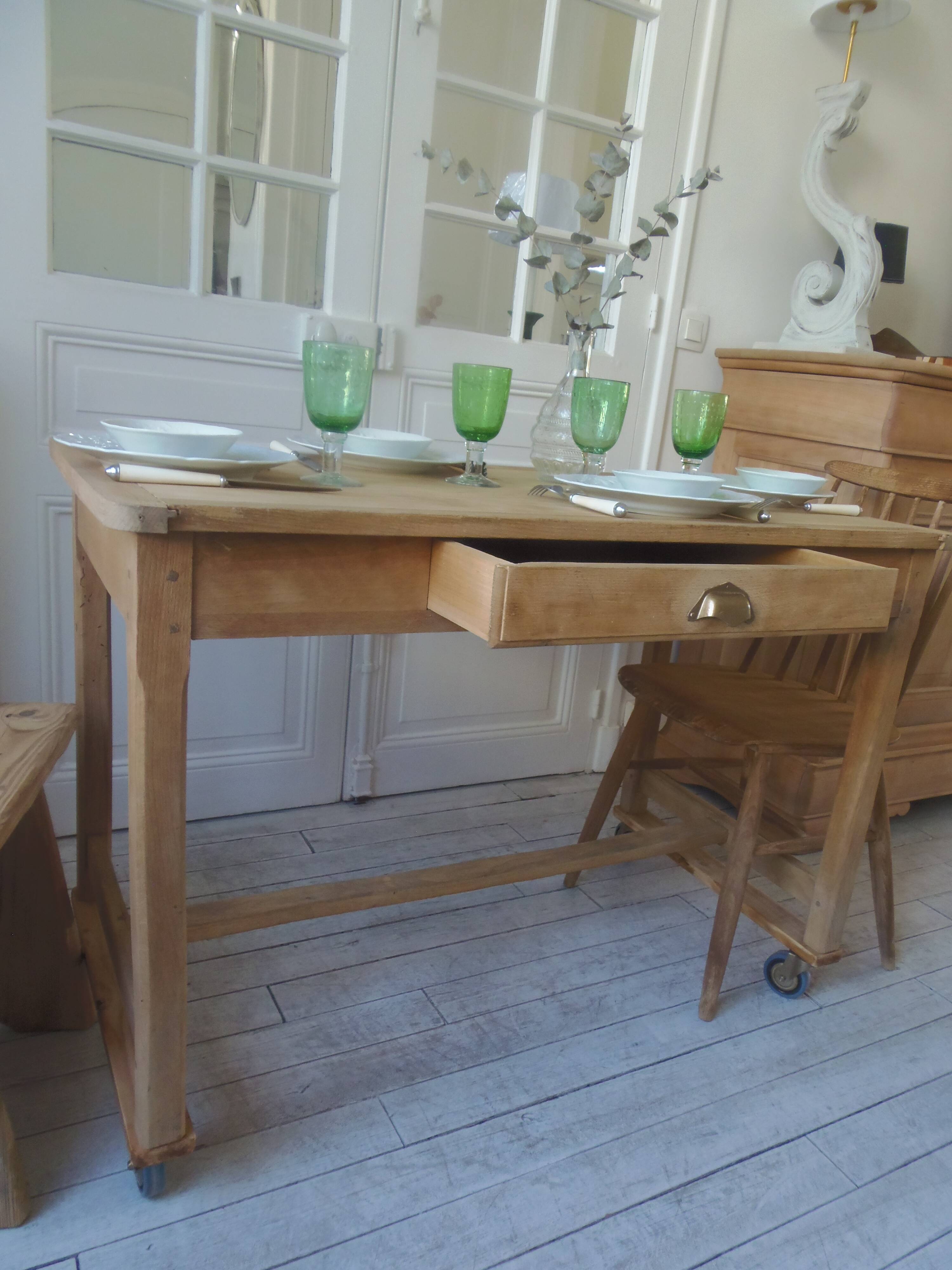 Vintage kitchen table on casters.