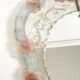 Italian mid-century wall mirror with a Murano glass frame and blossoms