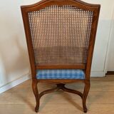 Two Regency-style caned armchairs with upholstered seats