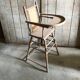 High chair doll