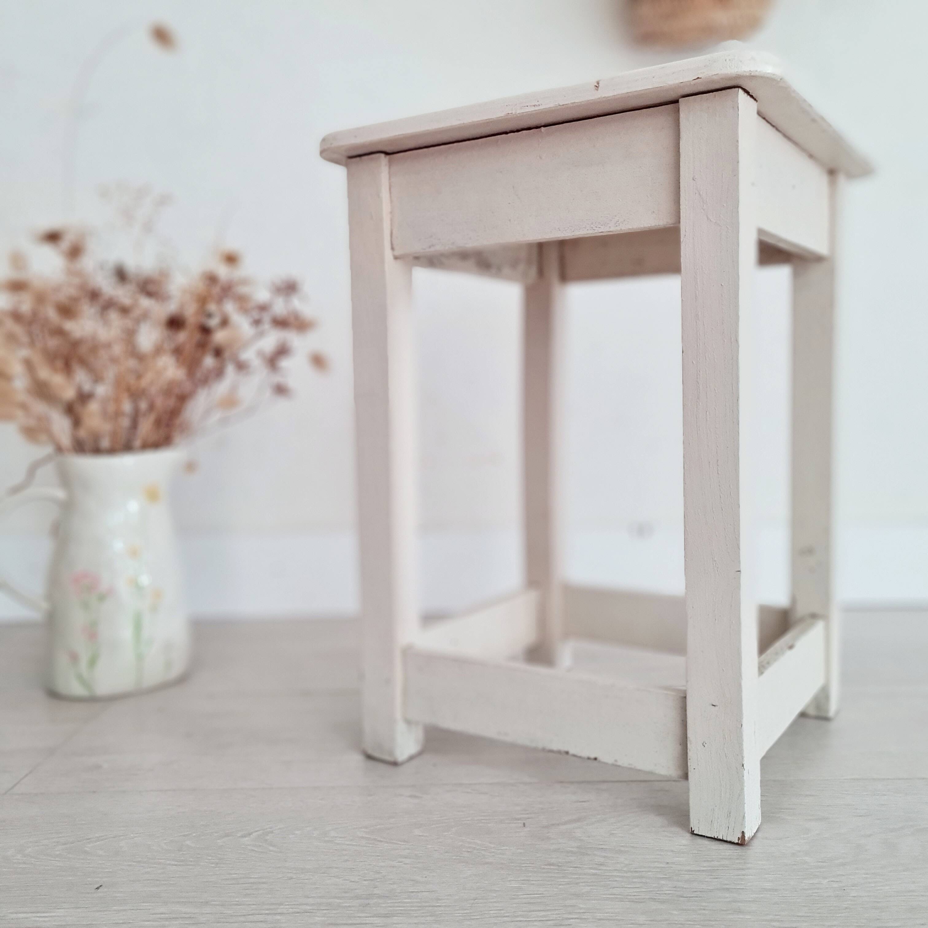 Old stool with white patina