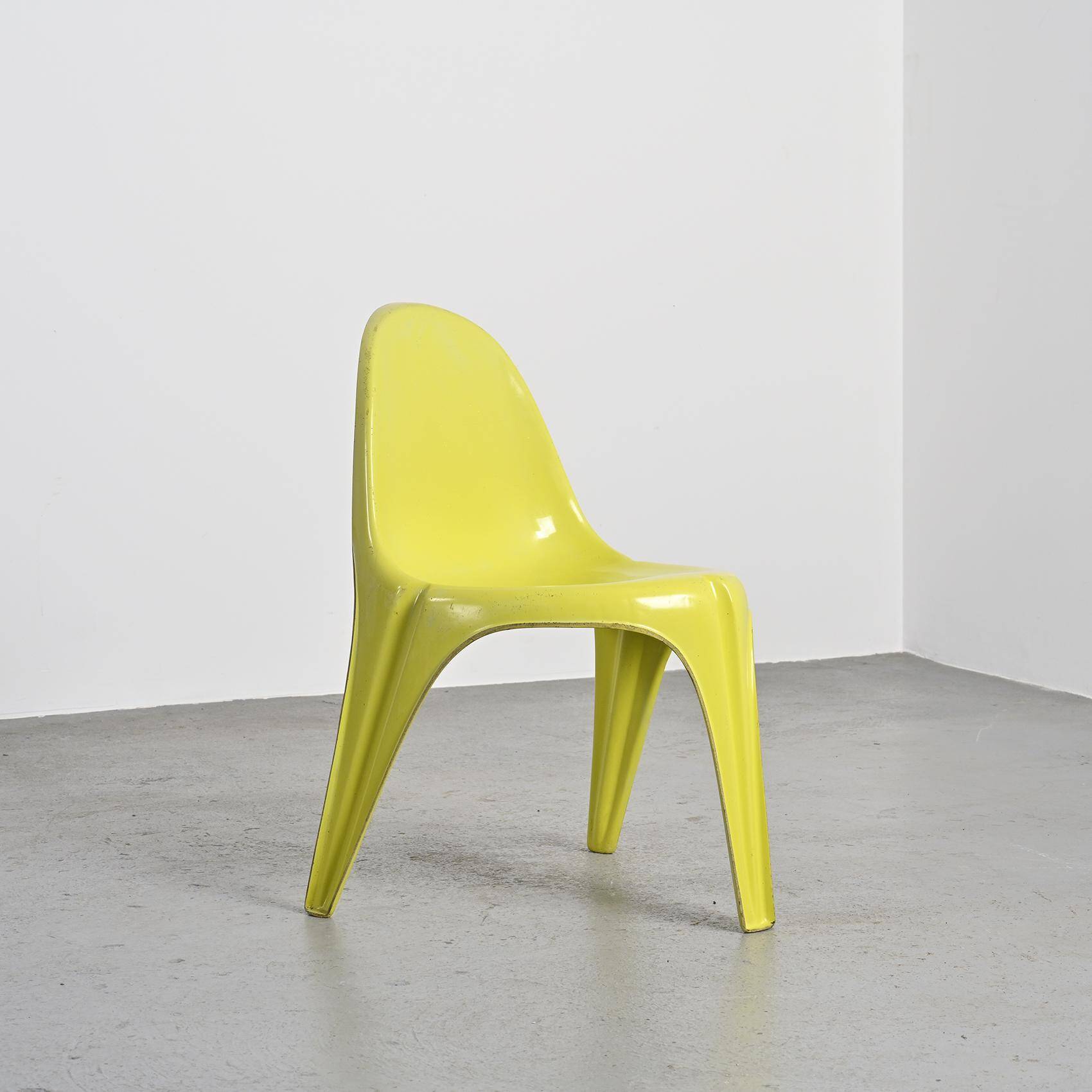 Pair of yellow fiberglass tripod chairs by Walter Frey, circa 1968