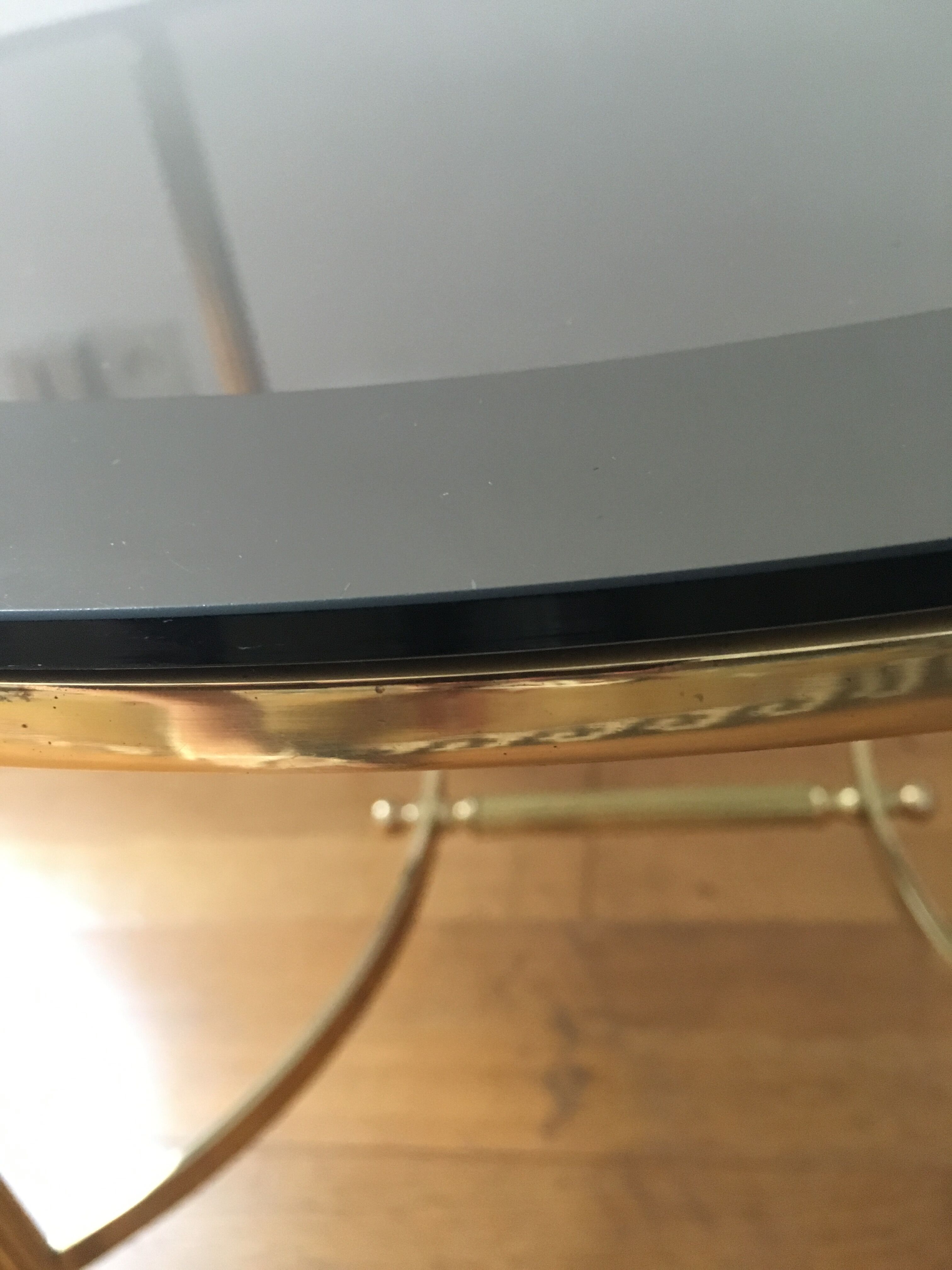 Brass round coffee table and smoked glass