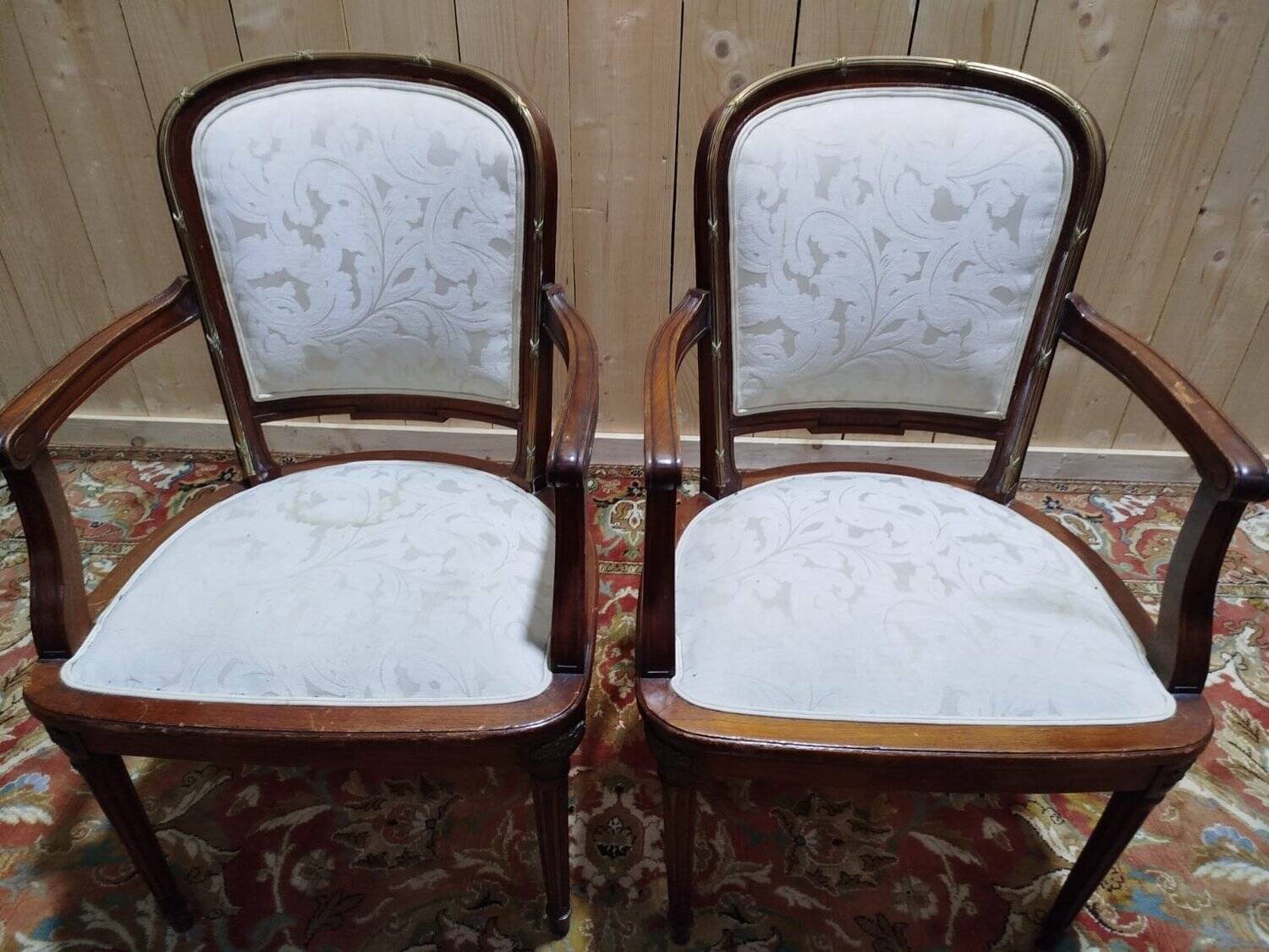 Suite de 8 chaises et paire de fauteuils Louis XVI