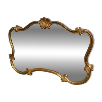 Turned champ-shaped mirror