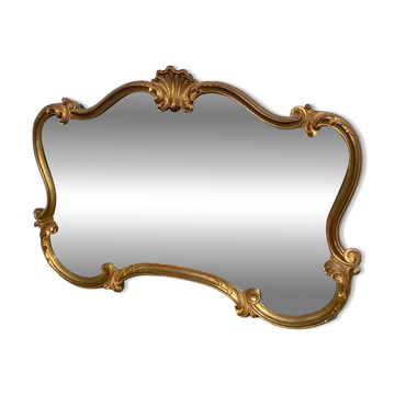 Turned champ-shaped mirror