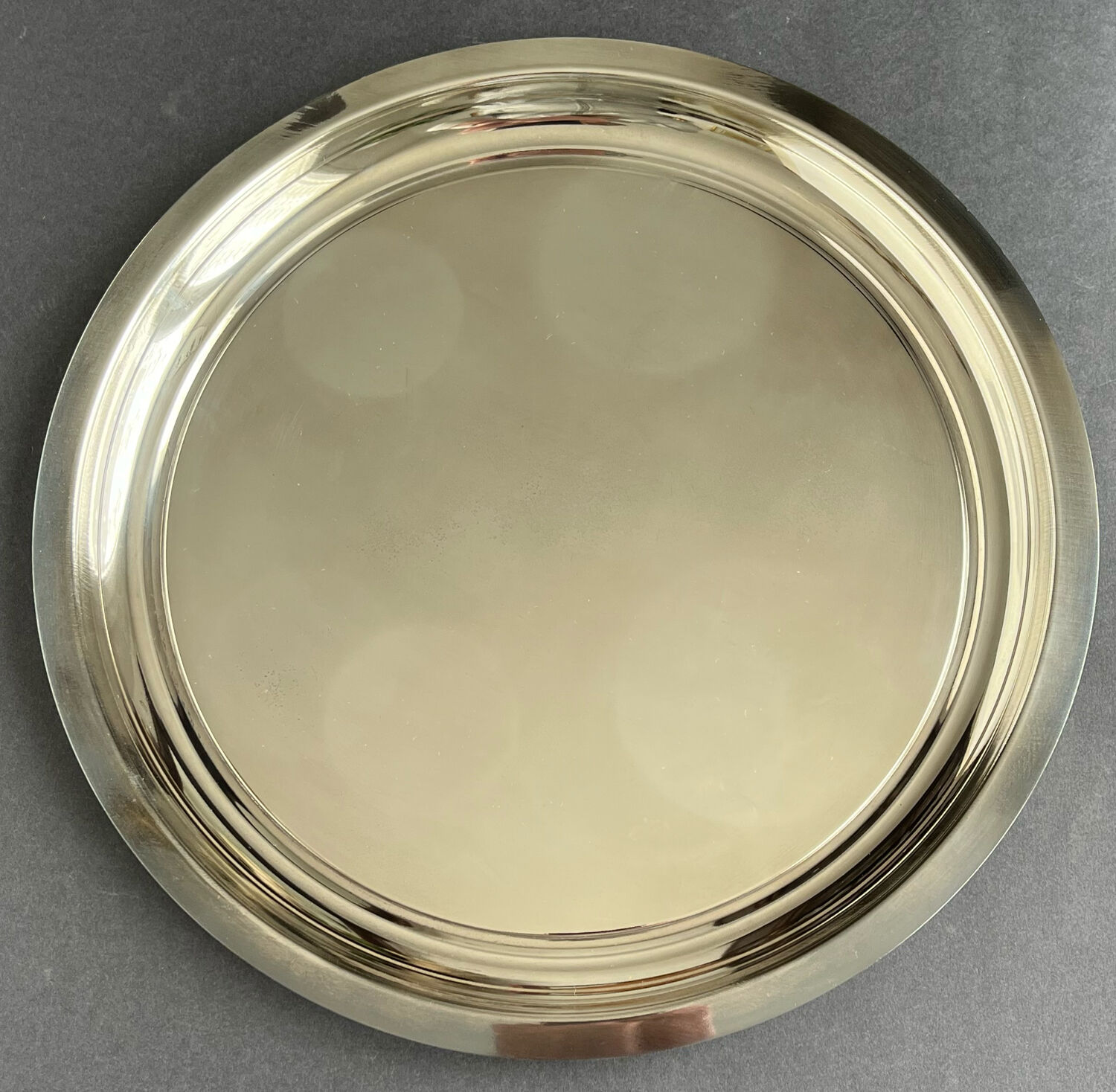 Circular silver metal tray